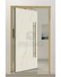 PIVOT Cristallo - Aluminium-Drehtür mit Cristallo-Sinterquarz verkleidet