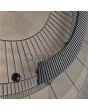 PIVOT M6 – Drehtür mit bronzefarbener Struktur aus gefrästem Metall
