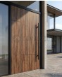 Aluminium-Drehtür mit Hochdrucklaminat in Walnussoptik